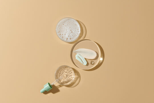 Top drops and smears of cosmetics on a petri dish and a pipette