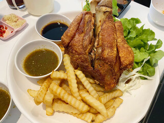 close up view of delicious asian cuisine, pork fried with potato.