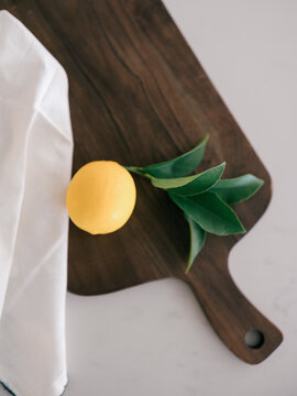 Fresh picked lemons on cutting board
