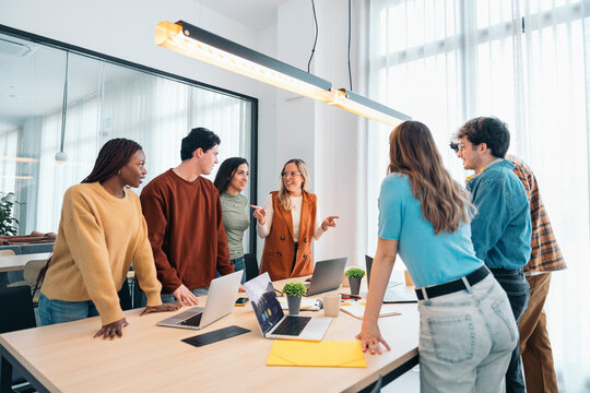 Creative team collaborating in modern office