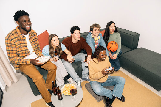 Friends enjoying a game night at home