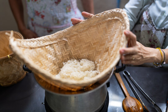 Sticky rice steaming in bamboo.