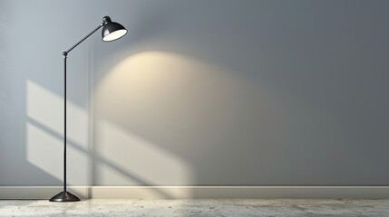 Light gray wall with a solitary industrial metal lamp