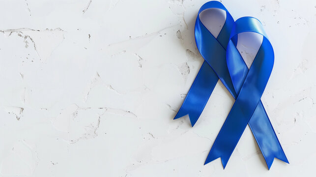 Flat lay blue cancer ribbon marble background colon prostate diabetes men mental health colorectal support awareness month fundraise charity treatment surviving copy space banner medical campaign
