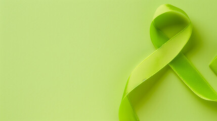 Flatlay lime green cancer ribbon blank background lymphoma, non-hodgkin lyme disease duchenne muscular duchenne dystrophy mitochondrial support awareness fundraising survivor copy space