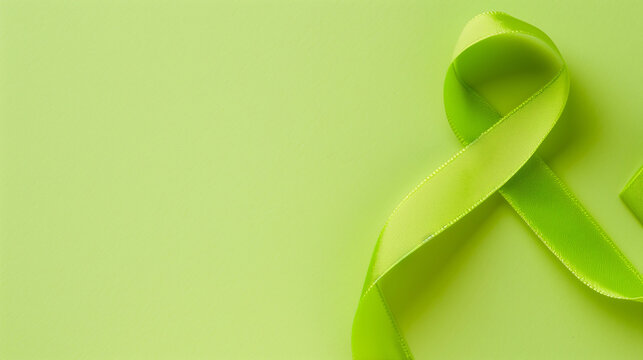 Flatlay lime green cancer ribbon blank background lymphoma, non-hodgkin lyme disease duchenne muscular duchenne dystrophy mitochondrial support awareness fundraising survivor copy space - Powered by Adobe