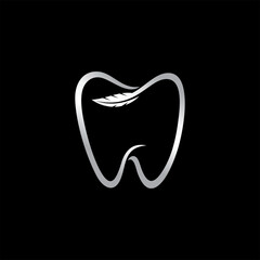 Tooth logo with feather  concept