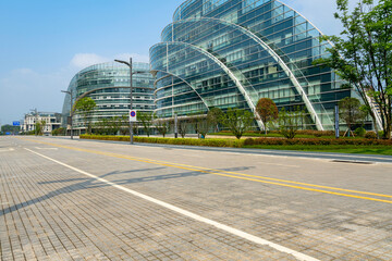 Empty paths and modern office buildings in science and technology parks, Chongqing, China.