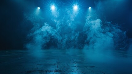 Blue spotlights illuminate an empty stage covered in smoke. - obrazy, fototapety, plakaty