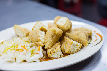 Deep fry stinky tofu on the dish