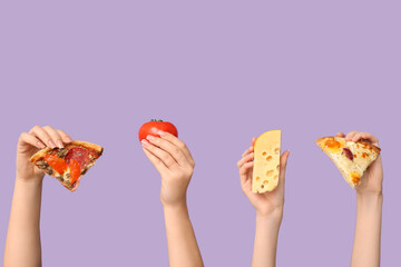 Many hands holding pizza slices, tomato and cheese on lilac background