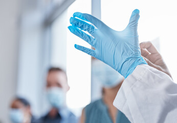 Doctor, hands and gloves for ppe protection or medical surgery for hygiene, compliance or pandemic....