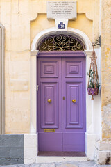 Fototapeta na wymiar typical entrance doors of houses in Valletta, Malta