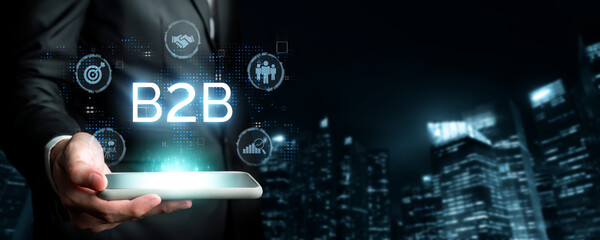 Business person navigates B2B landscape, harness technology to enhance business-to-business...