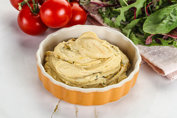 Creamy hummus in the bowl
