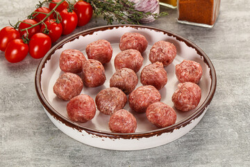 Uncooked raw beef meatball minced