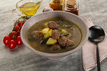 Soup with meatball and potato