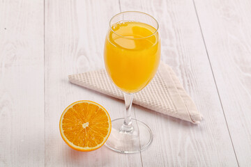 Sweet fresh orange juice in the glass