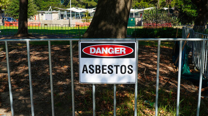 asbestos sign.Asbestos in Sydney park nsw Australia. asbestos danger. closed park.