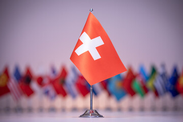 Switzerland flag with a gray and clean background.