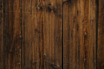 Vintage brown yellow wood background texture with knots and nail holes. Old painted wood wall. Brown abstract background. Vintage wooden dark horizontal boards. Front view with empty copy space.