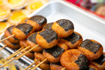 Deep fried skewers Chinese street food in Nankin-machi neighborhood in Kobe, Japan.