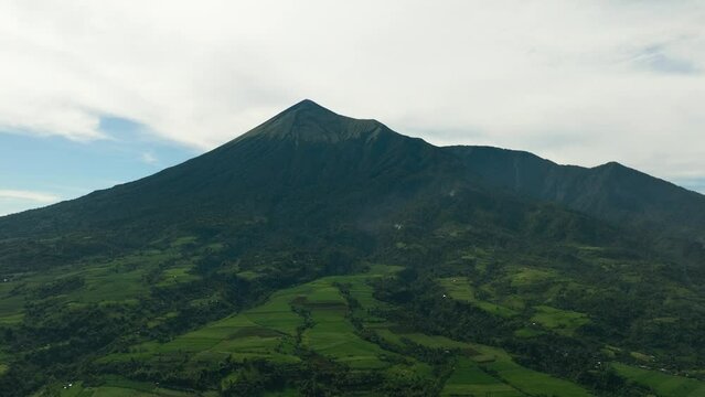 Aerial drone of agricultural plantations and farmland at the foot of the Canlaon volcano. Negros, Philippines