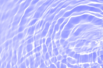 Purple water bubbles on the surface ripples. Defocus blurred transparent pink colored clear calm...