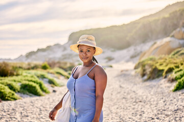 Portrait, beach or black woman on holiday to relax on vacation break in Greece at sunset in summer. Tourist, girl or African person looking to at ocean, nature or sea with peace, wellness or travel