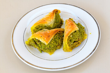 Turkish Dessert Sobiyet  Baklava, mussels baklava and classic baklava with Pistachio . Cevizli, Fistikli Baklava, top view.