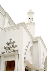 minaret of mosque on white background isolated