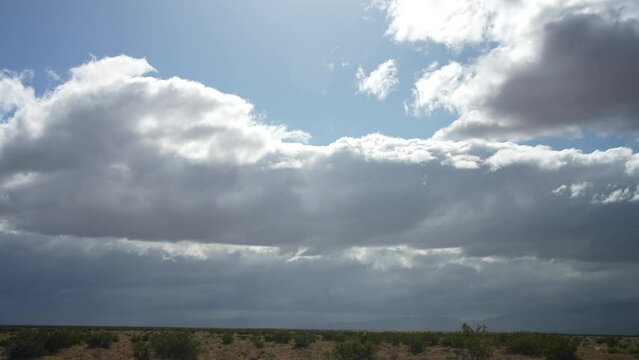 Of the Mojave Desert with clouds drifting above.