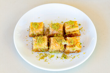 Turkish Dessert Sobiyet  Baklava, mussels baklava and classic baklava with Pistachio . Cevizli, Fistikli Baklava, top view.