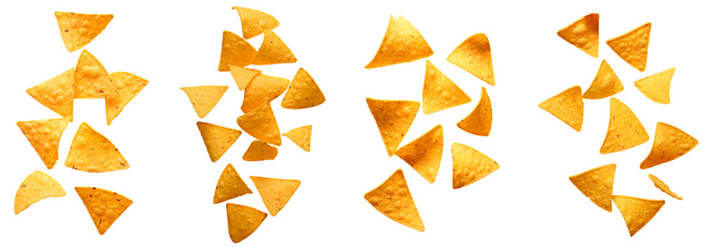 Flying delicious Mexican nachos chips on white background