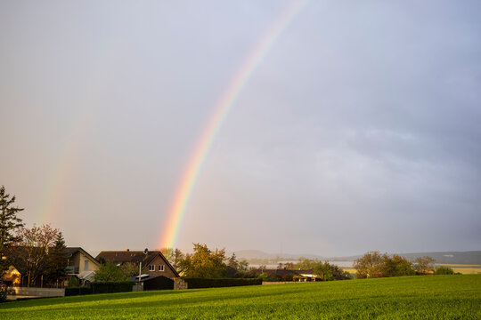 rainbow over a village