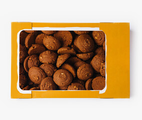 Box of chocolate cookies on white background