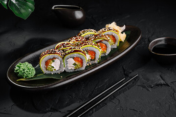 Elegant sushi platter on dark background