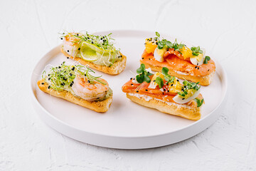 Gourmet bruschetta platter on white background