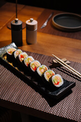 Sushi platter presentation on elegant dining table