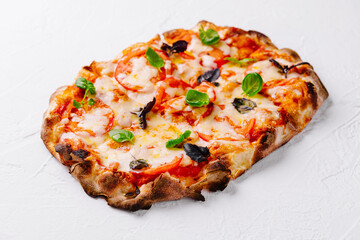 Fresh baked margherita pizza on white background
