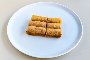 Turkish Dessert Sobiyet  Baklava, mussels baklava and classic baklava with Pistachio . Cevizli, Fistikli Baklava, top view.