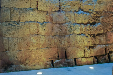 The fortress wall is illuminated at night. It is a monument of ancient Persian fortification...