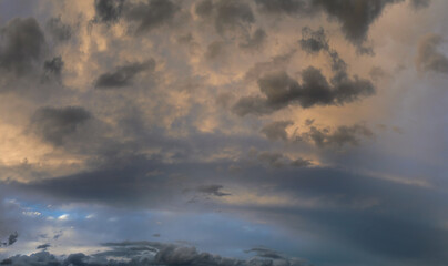 Dramatic sky dackground, stormy clouds in dark sky