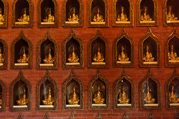 Many Buddha statues in a hindu temple in Vietnam