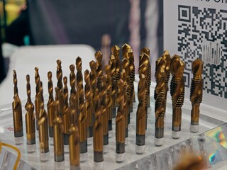 CNC cutters for metal. Multi-colored drills close-up. Accessories for engraving, milling, cutting...