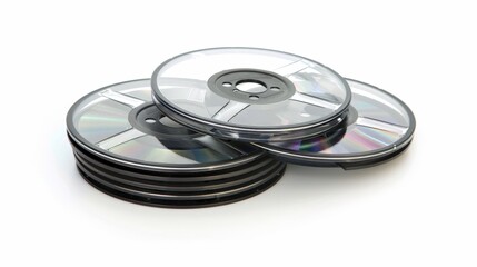 A stack of compact disks on a white surface