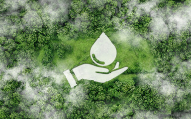 World Water Day and Save Water concept. Clean water drop icon in hand on nature background. Environment Save and Care ecology theme concept. Sustainable water use