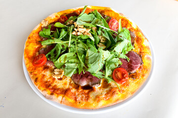 Traditional Turkish cuisine. Pizza, pita, pidesi, sucuk, hummus, kebab. Many dishes on the table. Serving dishes in restaurant. Margherita,  mix, formaggi, veggie karisik pizza. Top view, flat lay