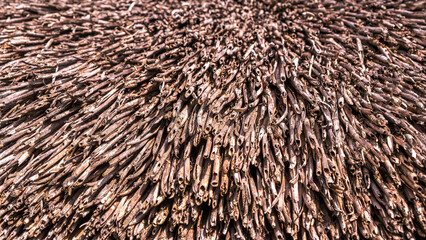 Close up of thatch roof or wall background. Tropical roofing on beach. High quality photo
