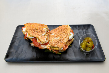 Turkish karisik atom  tost ( kasarli bazlama tost) . Sucuklu, Kasarli, kavurmali karisik tost. Flat...